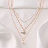 Collier femme pendentif en cristal à motif papillon, chaîne de perles de clavicule, collier multicouche
