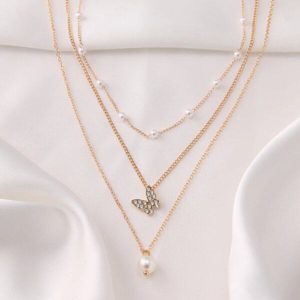 Collier femme pendentif en cristal à motif papillon, chaîne de perles de clavicule, collier multicouche