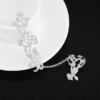 Bague fantaisie femme – anneau à maillons avec chaîne et strass