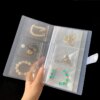 porte boucle d oreille Sac d'albums de stockage d'évaluation de bijoux, boîtes à matiques de collier anti-d'effets
